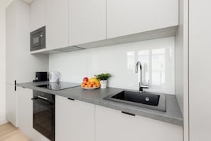 Apartment, 1 Bedroom, Balcony | Private kitchenette | Microwave, oven, coffee/tea maker, electric kettle