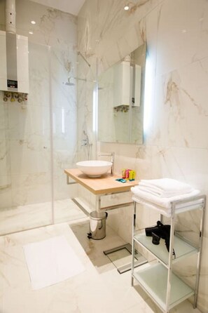 Hair dryer, towels, soap, shampoo