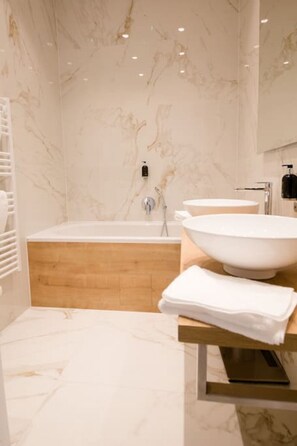 Hair dryer, towels, soap, shampoo