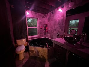 Shower, jetted bath, towels, soap