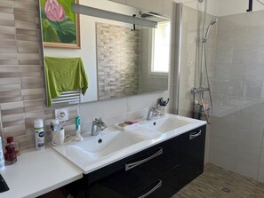 Shower, hair dryer, towels, soap