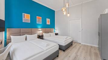 2 habitaciones, tabla de planchar con plancha, wifi y ropa de cama