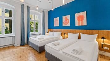 3 habitaciones, tabla de planchar con plancha, wifi y ropa de cama