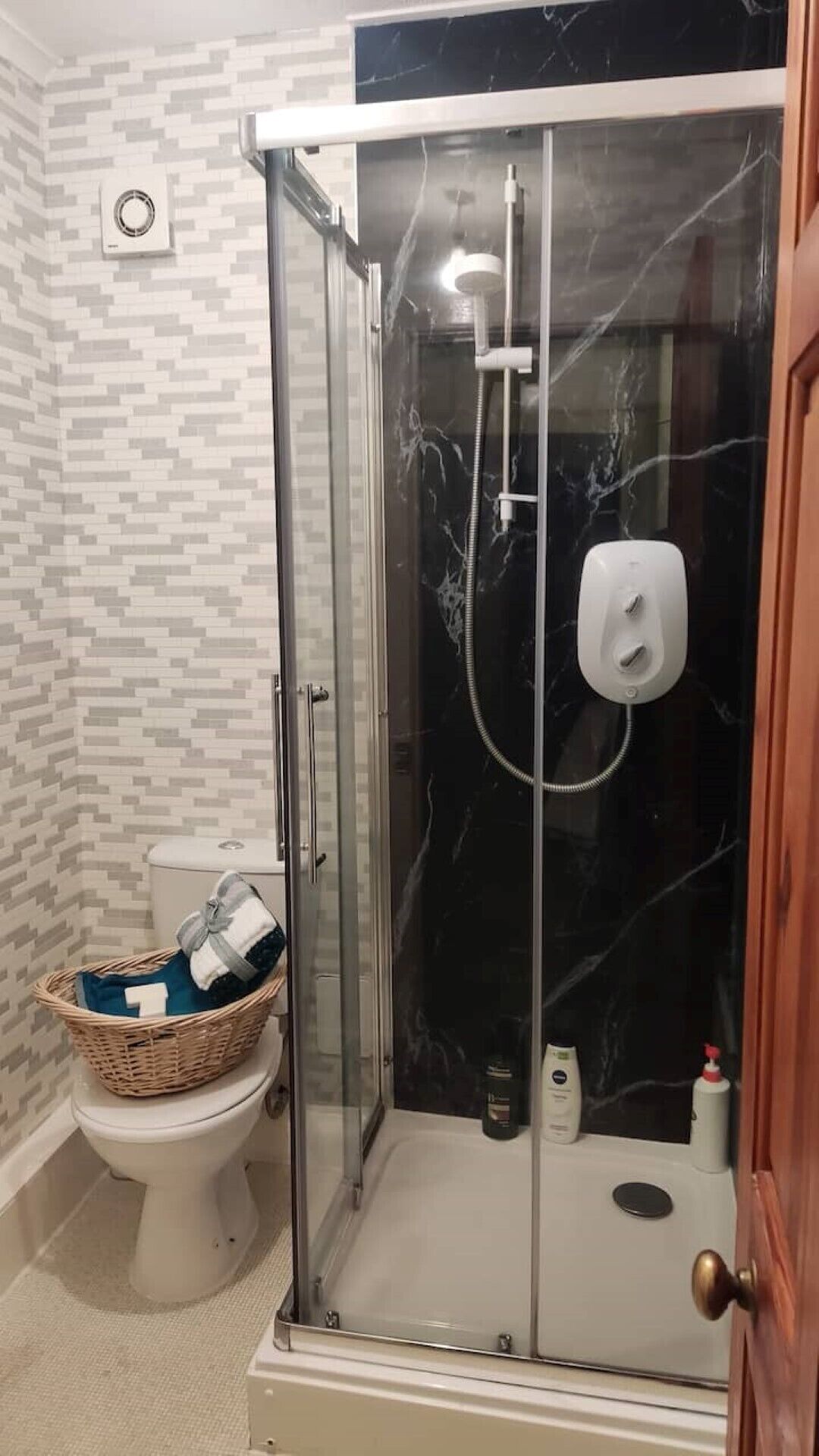 Shower, towels, soap, shampoo
