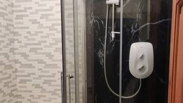 Shower, towels, soap, shampoo