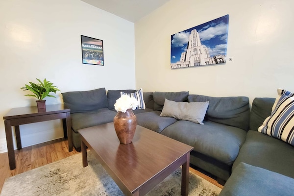 Comfy Living Room with Local Artwork