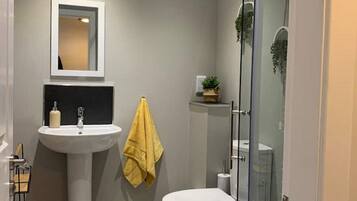 Shower, towels, soap, shampoo