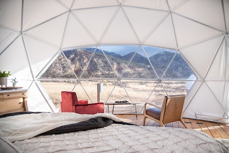 1 bedroom, bed sheets. Little Village Retreat Dome 3