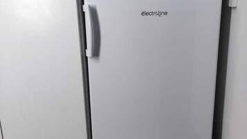 Condo família | Cozinha privada | Frigobar, cooktop, talheres/pratos/utensílios de cozinha