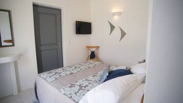 1 chambre, fer et planche à repasser, Wi-Fi gratuit, draps fournis