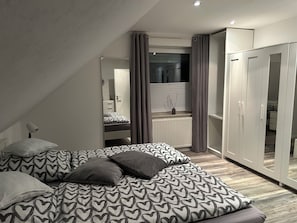 2 bedrooms, iron/ironing board, travel cot, WiFi