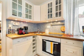 Réfrigérateur, four, plaque de cuisson, lave-vaisselle