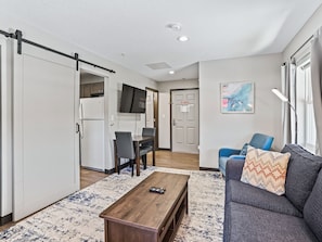 Suite, 2 Bedrooms, Non Smoking | Desk, laptop workspace, blackout curtains, iron/ironing board