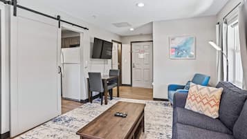 2 Queen Beds, 1-Bedroom Suite, Living Room, Non-Smoking | Desk, laptop workspace, blackout curtains, iron/ironing board