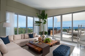 Presidential Apartment, Ocean View | Desk, laptop workspace, iron/ironing board, free WiFi