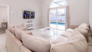 House, Multiple Beds, Pool Access, Pool View (Cozy on Cavendish) | Living area | 42-inch flat-screen TV with digital channels