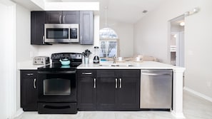 House, Multiple Beds, Pool Access, Pool View (Cozy on Cavendish) | Private kitchen | Fridge, microwave, oven, stovetop