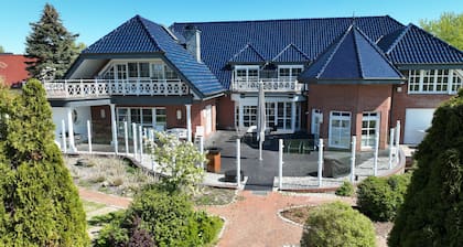Villa with swimming pool and sauna and park on the Warnow