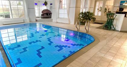 Villa with swimming pool and sauna and park on the Warnow