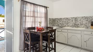 Junior Apartment | Private kitchen | Full-size fridge, microwave, oven, coffee/tea maker