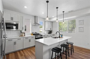 Fridge, microwave, oven, stovetop