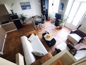 City Apartment | Living area | 60-cm Smart TV with cable channels, TV, Netflix