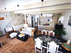 City Apartment | Living area | 60-cm Smart TV with cable channels, TV, Netflix