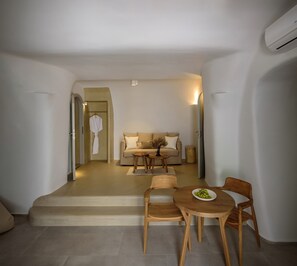 Luxury Suite, Hot Tub, Garden View | Living area | 38-inch LCD TV with digital channels, TV - Oia Treasures Art Suites (Santorini)