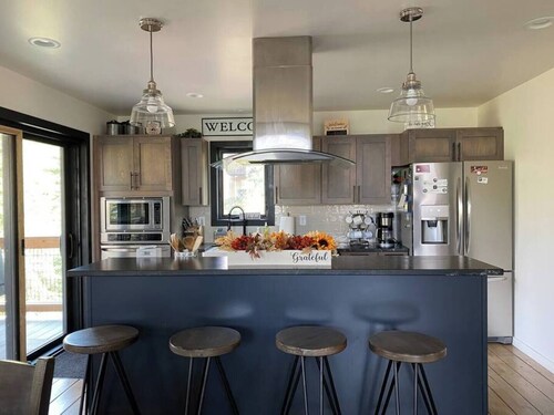 This house is a 5 bedroom(s), 3.5 bathrooms, located in Lead, SD.