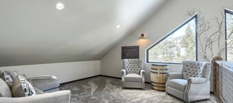 Modern ski lodge is right next to the slopes and offers wonderful views and hot tub