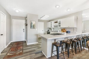 Condo, Multiple Beds, Kitchen, Garden View | Private kitchen | Fridge, microwave, oven, stovetop