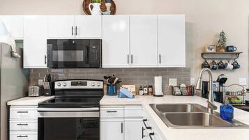 Condo, 1 King Bed with Sofa bed, Patio, Golf View (Vansen's Golfshores) | Private kitchen | Coffee/tea maker