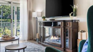 Condo, 1 King Bed with Sofa bed, Patio, Golf View (Vansen's Golfshores) | Living area | 65-inch flat-screen TV with digital channels