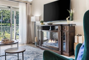 Condo, 1 King Bed with Sofa bed, Patio, Golf View (Vansen's Golfshores) | Living area | 65-inch flat-screen TV with digital channels