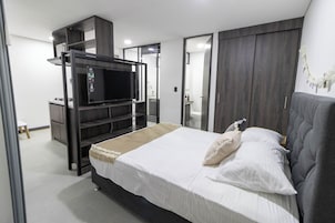 Basic Apartment 201 | Down comforters, pillowtop beds, desk, laptop workspace