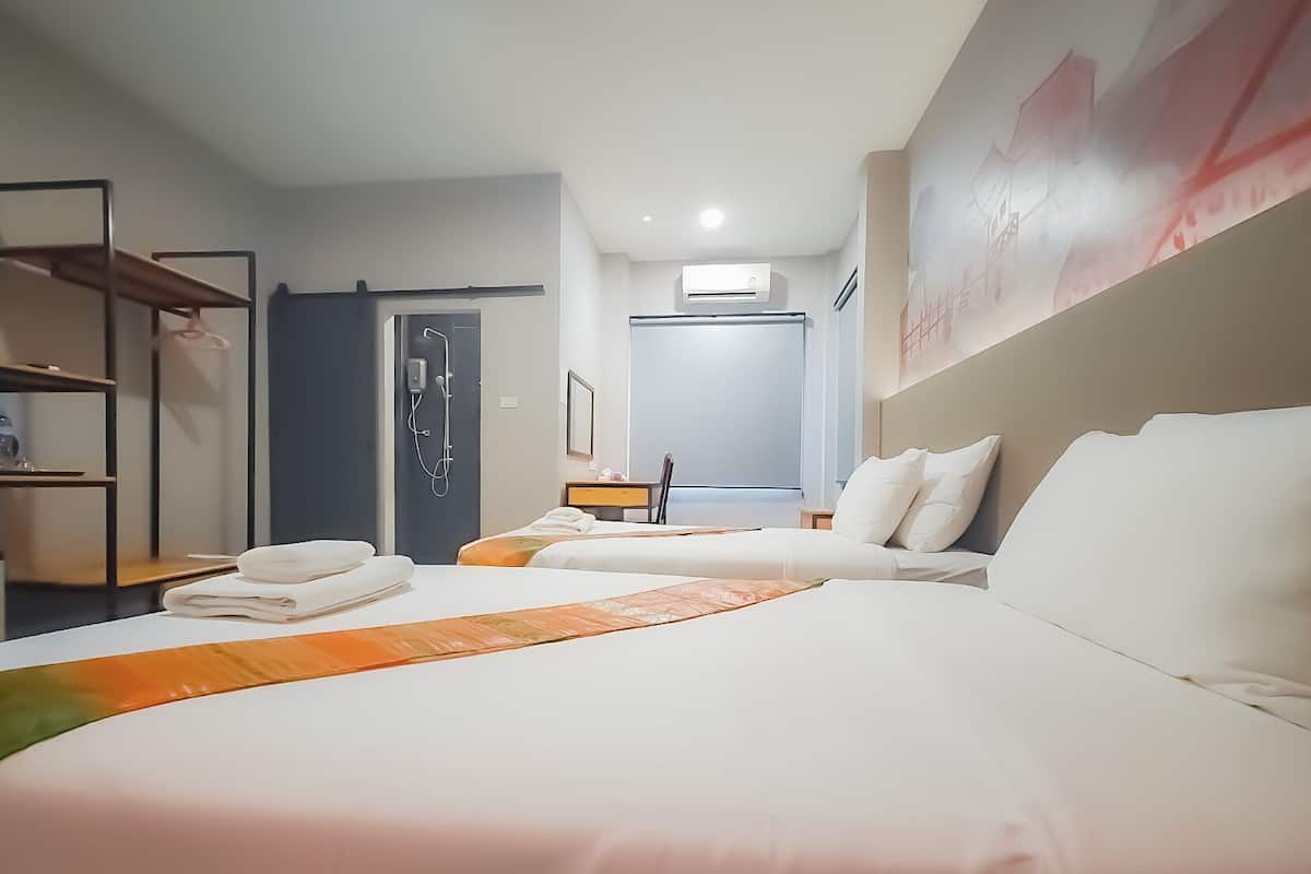 Desk, laptop workspace, free WiFi, bed sheets