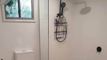 Bathtub, hair dryer, towels, soap