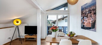 Appartement "Am See" avec vue sur les montagnes, jardin partagé et Wi-Fi.