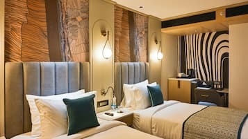 Deluxe Room, City View | Minibar, in-room safe, individually decorated, individually furnished