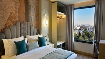 Premium bedding, memory foam beds, minibar, in-room safe