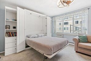 Desk, iron/ironing board, travel cot, free WiFi