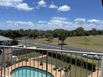 Balcony overlooking pool