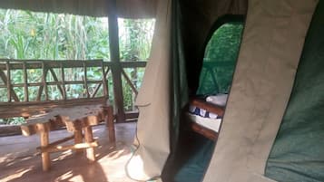 Desk, laptop workspace, iron/ironing board, bed sheets