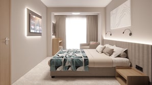 A modern bedroom with a bed, bedside tables, a desk, and a chair.
