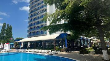 Seasonal outdoor pool, pool umbrellas, pool loungers