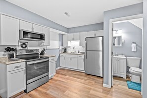 Fridge, oven, stovetop, coffee/tea maker - Spacious 2 Bedroom Townhome by StayLage (Saint Charles)