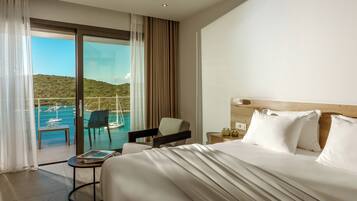 Deluxe kamer, uitzicht op zee | Luxe beddengoed, donzen dekbedden, een kluis op de kamer