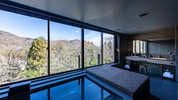 Luxury Suite, Non Smoking | Bathroom | Separate bathtub and shower, spring water bathtub, free toiletries
