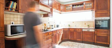 Apartment | Private kitchen | Full-size fridge, microwave, oven, stovetop