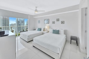 1 bedroom, desk, iron/ironing board, travel crib